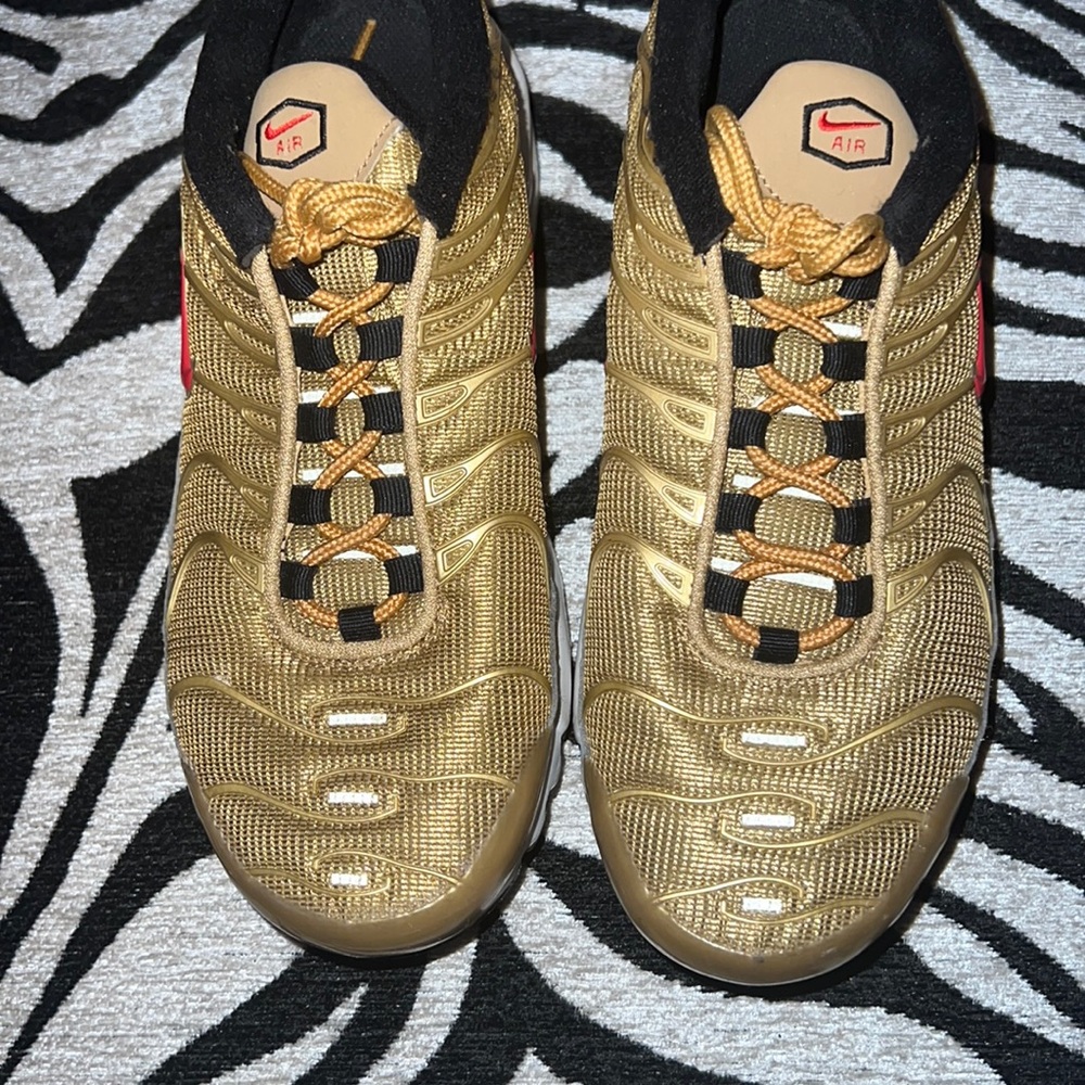 Gold Nike TN Air shoes